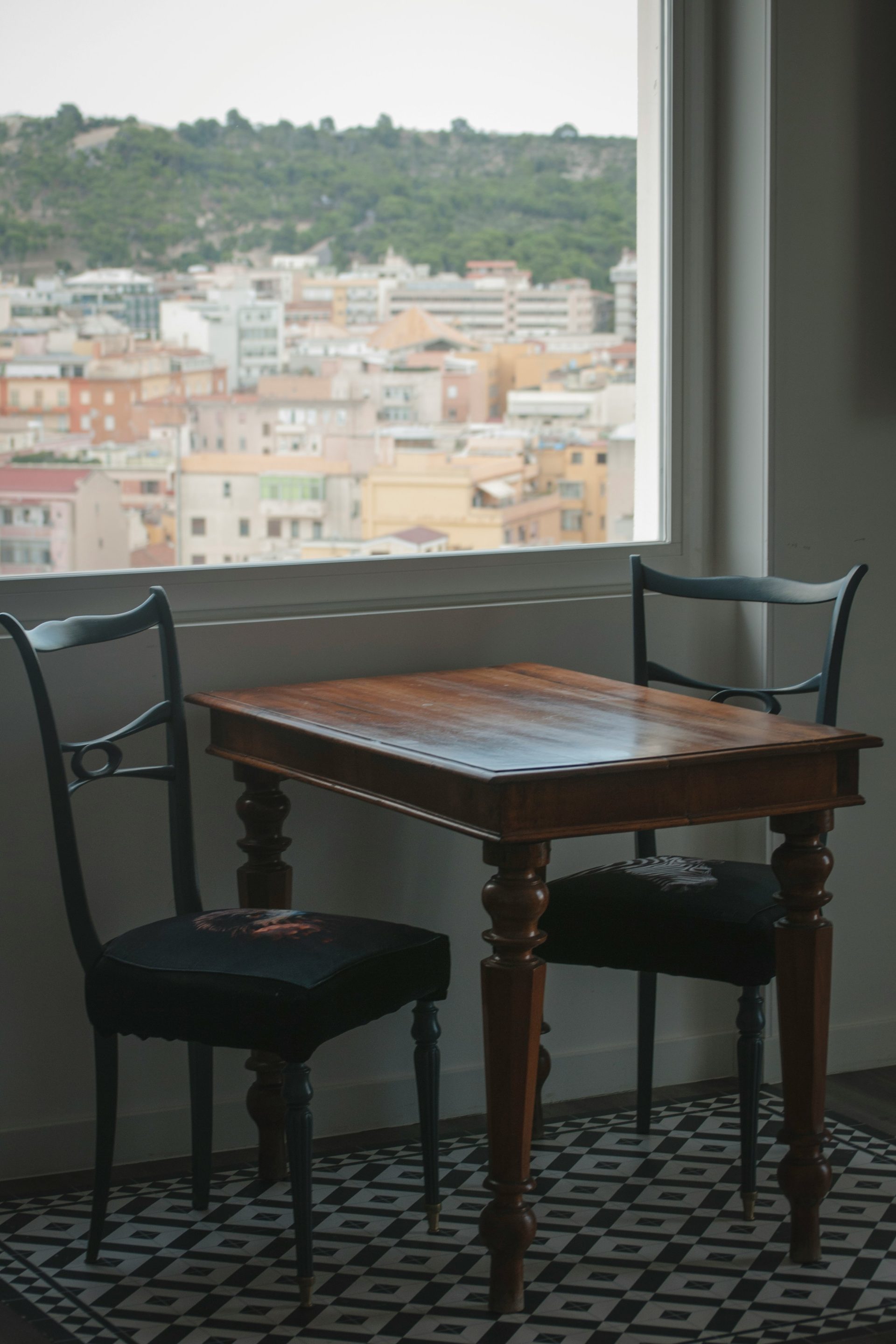 brown wooden table and chairs
